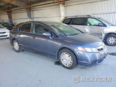 Czwarte zdjęcie samochodu z boku: 2009 HONDA CIVIC HYBRID VIN:JHMFA36299S003299 - miniatura