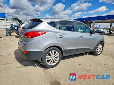 Trzecie zdjęcie samochodu z tyłu: 2011 HYUNDAI TUCSON LIMITED VIN:KM8JU3AC4BU140711 - miniatura