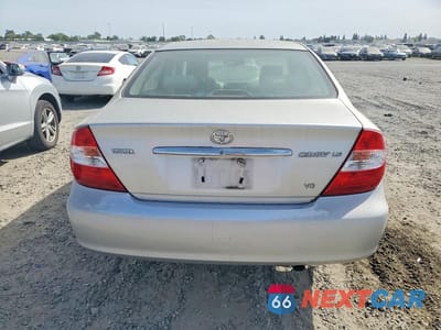Zdjęcie 6 z 11 samochodu: 2004 TOYOTA CAMRY LE V6 VIN:4T1BF30K04U569788 - miniatura