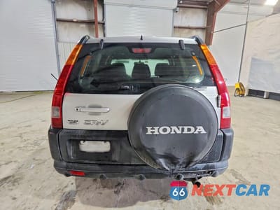 Zdjęcie 6 z 13 samochodu: 2003 HONDA CR-V LX VIN:SHSRD68453U102771 - miniatura