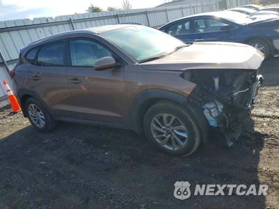 Czwarte zdjęcie samochodu z boku: 2016 HYUNDAI TUCSON SE VIN:KM8J3CA45GU138128 - miniatura