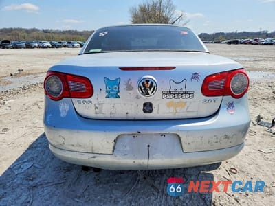 Zdjęcie 6 z 13 samochodu: 2011 VOLKSWAGEN EOS KOMFORT VIN:WVWAA7AH6BV000234 - miniatura