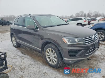 Czwarte zdjęcie samochodu z boku: 2015 VOLKSWAGEN TOUAREG V6 TDI VIN:WVGEP9BP0FD002814 - miniatura