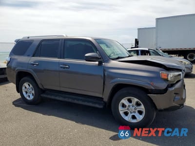 Czwarte zdjęcie samochodu z boku: 2014 TOYOTA 4RUNNER SR5 VIN:JTEZU5JR4E5064599 - miniatura