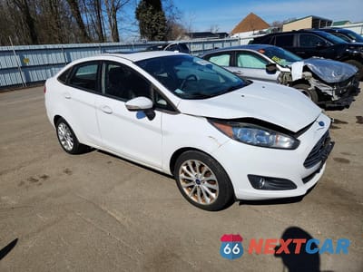 Czwarte zdjęcie samochodu z boku: 2014 FORD FIESTA SE VIN:3FADP4BJ2EM194650 - miniatura