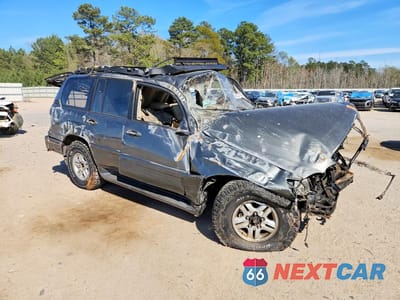 Czwarte zdjęcie samochodu z boku: 1999 LEXUS LX 470 BASE VIN:JT6HT00W7X0048644 - miniatura