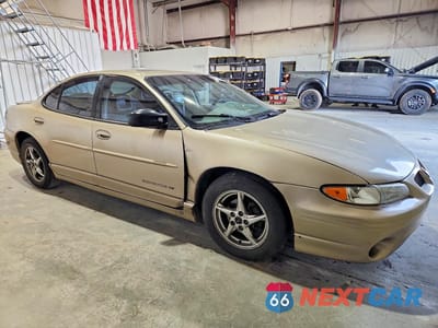 Czwarte zdjęcie samochodu z boku: 2000 PONTIAC GRAND PRIX GT VIN:1G2WP52K1YF285287 - miniatura