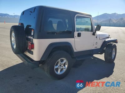 Trzecie zdjęcie samochodu z tyłu: 1997 JEEP WRANGLER / TJ SAHARA VIN:1J4FY49S4VP514604 - miniatura