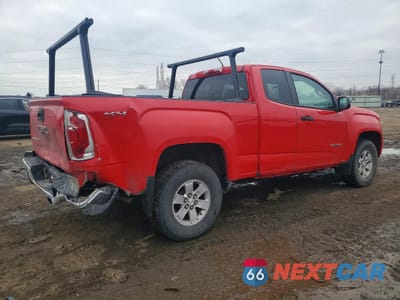 Trzecie zdjęcie samochodu z tyłu: 2018 GMC CANYON VIN:1GTH6BEA1J1105821 - miniatura