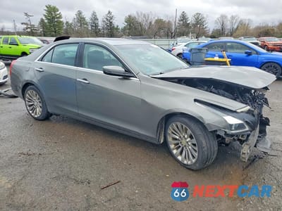 Czwarte zdjęcie samochodu z boku: 2016 CADILLAC CTS LUXURY COLLECTION VIN:1G6AX5SXXG0126130 - miniatura