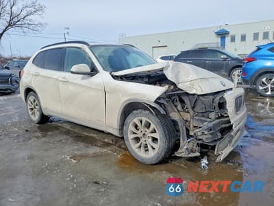 Czwarte zdjęcie samochodu z boku: 2013 BMW X1 XDRIVE28I VIN:WBAVL1C52DVR86311 - miniatura