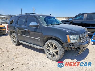Czwarte zdjęcie samochodu z boku: 2011 CHEVROLET TAHOE C1500 LTZ VIN:1GNSCCE02BR393998 - miniatura