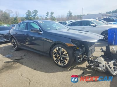 Czwarte zdjęcie samochodu z boku: 2026 BMW 530 XI VIN:WBA53FJ07TCU99894 - miniatura