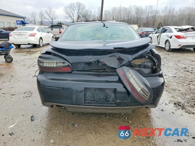 Zdjęcie 6 z 11 samochodu: 1997 PONTIAC GRAND PRIX GTP VIN:1G2WP5218VF291705 - miniatura