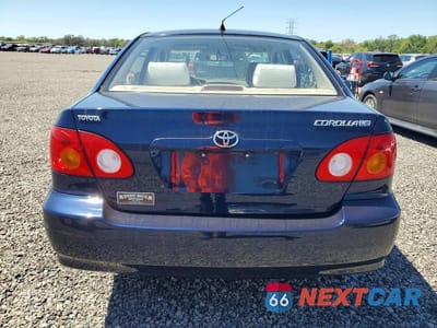 Zdjęcie 6 z 12 samochodu: 2004 TOYOTA COROLLA LE VIN:JTDBR32E242035321 - miniatura