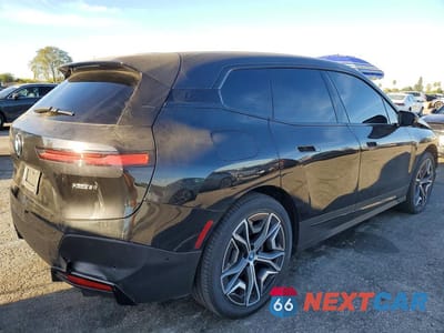 Trzecie zdjęcie samochodu z tyłu: 2024 BMW IX XDRIVE50 VIN:WB523CF01RCN95800 - miniatura