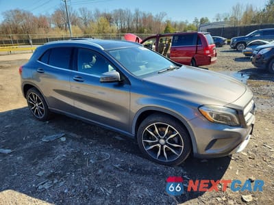 Czwarte zdjęcie samochodu z boku: 2015 MERCEDES-BENZ GLA 250 4MATIC VIN:WDCTG4GB9FJ028187 - miniatura