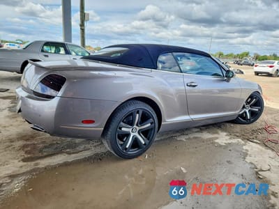 Trzecie zdjęcie samochodu z tyłu: 2009 BENTLEY CONTINENTAL GTC VIN:SCBDR33W79C060249 - miniatura