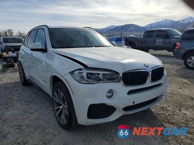 Czwarte zdjęcie samochodu z boku: 2014 BMW X5 SDRIVE35I VIN:5UXKR2C51E0H32955 - miniatura