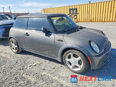 Czwarte zdjęcie samochodu z boku: 2006 MINI COOPER VIN:WMWRC33576TJ78774 - miniatura