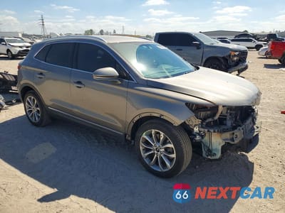 Czwarte zdjęcie samochodu z boku: 2016 LINCOLN MKC SELECT VIN:5LMCJ2C99GUJ24621 - miniatura