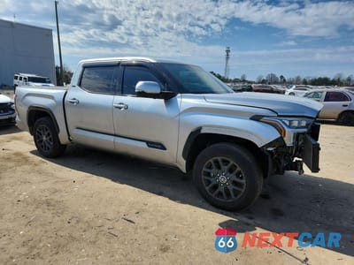 Czwarte zdjęcie samochodu z boku: 2022 TOYOTA TUNDRA PLATINUM VIN:5TFNA5DB9NX022332 - miniatura