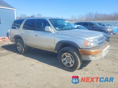 Czwarte zdjęcie samochodu z boku: 1999 TOYOTA 4RUNNER SR5 VIN:JT3HN86R5X0244802 - miniatura