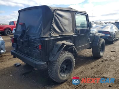 Trzecie zdjęcie samochodu z tyłu: 2004 JEEP WRANGLER / TJ SPORT VIN:1J4FA49S84P801236 - miniatura