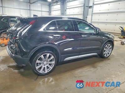 Trzecie zdjęcie samochodu z tyłu: 2023 CADILLAC XT4 PREMIUM LUXURY VIN:1GYFZDR42PF101961 - miniatura