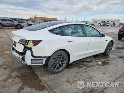 Trzecie zdjęcie samochodu z tyłu: 2021 TESLA MODEL 3 VIN:5YJ3E1EA3MF060528 - miniatura