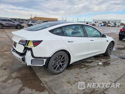 Trzecie zdjęcie samochodu z tyłu: 2021 TESLA MODEL 3 VIN:5YJ3E1EA3MF060528 - miniatura