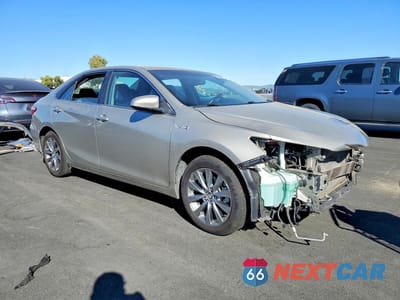 Czwarte zdjęcie samochodu z boku: 2015 TOYOTA CAMRY HYBRID XLE VIN:4T1BD1FK0FU145466 - miniatura