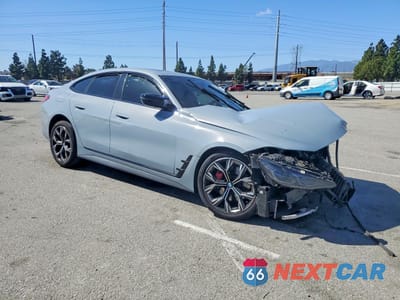 Czwarte zdjęcie samochodu z boku: 2022 BMW M440XI GRAN COUPE VIN:WBA13AW08NFN19548 - miniatura