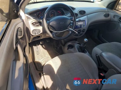 Zdjęcie 8 z 12 samochodu: 2001 FORD FOCUS ZX3 VIN:3FAFP31301R135471 - miniatura