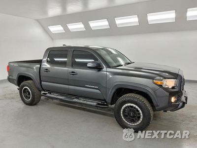 Czwarte zdjęcie samochodu z boku: 2019 TOYOTA TACOMA TRD OFF-ROAD VIN:3TMAZ5CN5KM103817 - miniatura