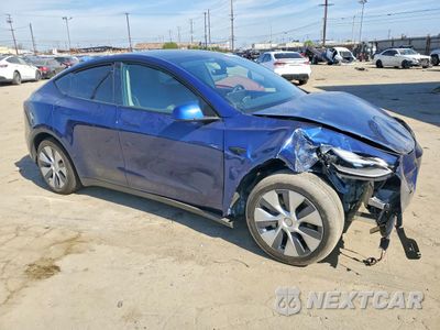 Czwarte zdjęcie samochodu z boku: 2024 TESLA MODEL Y VIN:7SAYGDED9RF005054 - miniatura