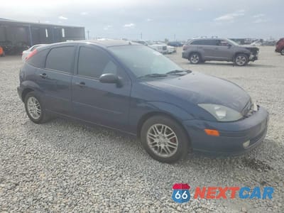 Czwarte zdjęcie samochodu z boku: 2003 FORD FOCUS VIN:3FAHP37333R106016 - miniatura