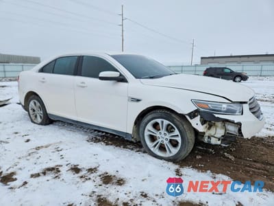 Czwarte zdjęcie samochodu z boku: 2018 FORD TAURUS SEL VIN:1FAHP2E88JG129434 - miniatura