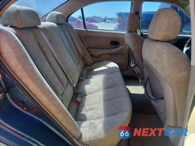 Zdjęcie 10 z 11 samochodu: 2002 HYUNDAI ELANTRA GLS VIN:KMHDN45D22U418489 - miniatura