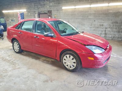 Czwarte zdjęcie samochodu z boku: 2004 FORD FOCUS SE COMFORT VIN:1FAFP34Z74W153919 - miniatura