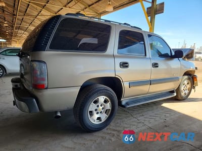 Trzecie zdjęcie samochodu z tyłu: 2003 CHEVROLET TAHOE C1500 VIN:1GNEC13V83R263922 - miniatura