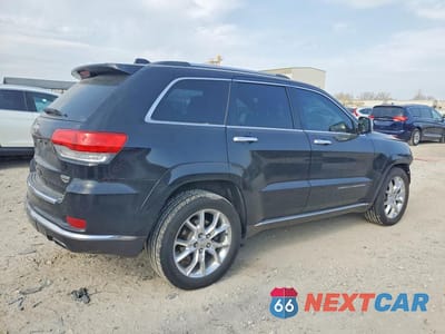 Trzecie zdjęcie samochodu z tyłu: 2014 JEEP GRAND CHEROKEE SUMMIT VIN:1C4RJFJT6EC130774 - miniatura