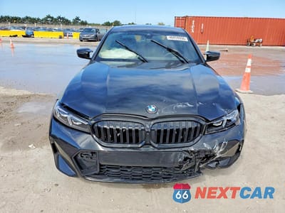 Piąte zdjęcie samochodu w środku: 2025 BMW 330I VIN:3MW69CW00S8F83149 - miniatura