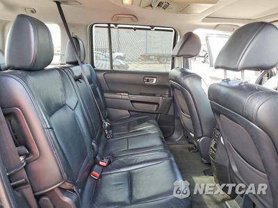 Zdjęcie 11 z 12 samochodu: 2013 HONDA PILOT TOURING VIN:5FNYF3H94DB031751 - miniatura