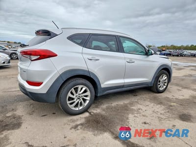 Trzecie zdjęcie samochodu z tyłu: 2016 HYUNDAI TUCSON SE VIN:KM8J3CA48GU134266 - miniatura