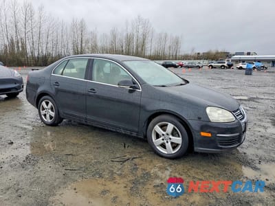Czwarte zdjęcie samochodu z boku: 2008 VOLKSWAGEN JETTA SE VIN:3VWRZ71K68M031300 - miniatura