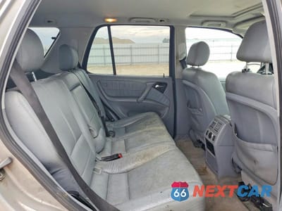Zdjęcie 10 z 11 samochodu: 2005 MERCEDES-BENZ ML 500 VIN:4JGAB75E05A568371 - miniatura