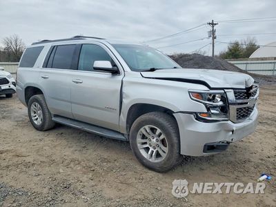 Czwarte zdjęcie samochodu z boku: 2019 CHEVROLET TAHOE VIN:1GNSKBKC3KR405636 - miniatura