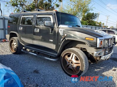 Czwarte zdjęcie samochodu z boku: 2005 HUMMER H2 VIN:5GRGN23U95H102074 - miniatura