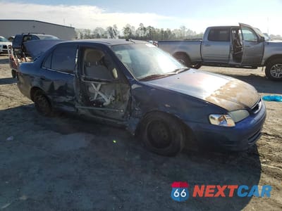 Czwarte zdjęcie samochodu z boku: 2000 TOYOTA COROLLA VE VIN:1NXBR12E9YZ331883 - miniatura